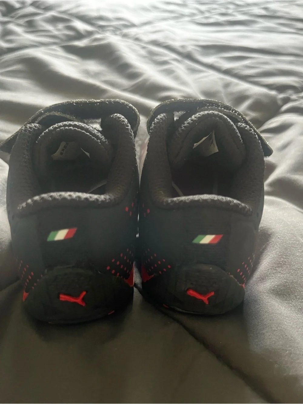 Puma Kids Black Sneakers with Red Underlay and White Puma Logos